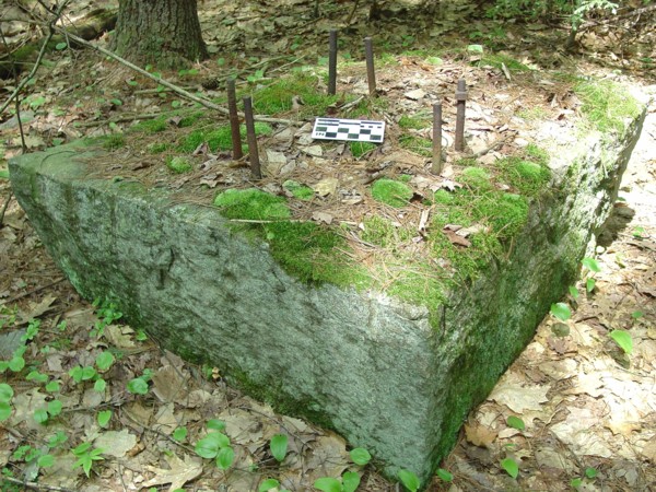 Quarried granite nlock with six threaded bolts to hold a derrick or crane Amherst NH