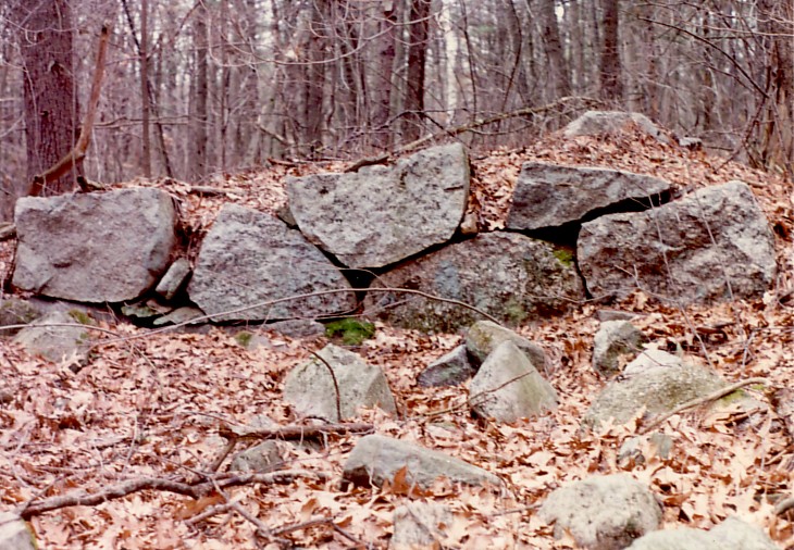 Quarried boulders in house foundation